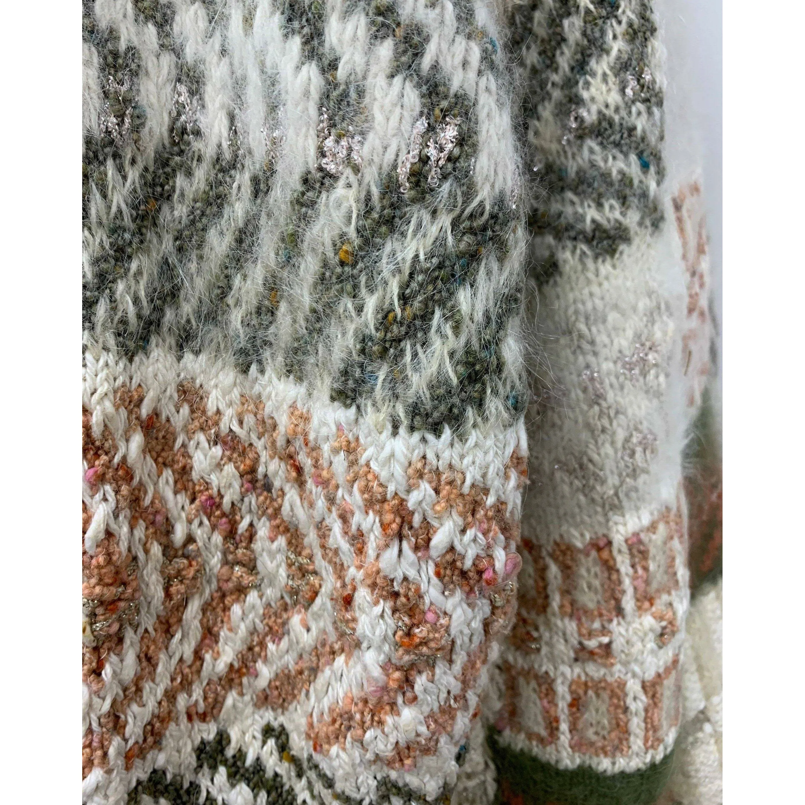 1980 Anny Blatt designed hand knit. The yarns are all French and Italian. Wool, Angora, Cotton, Linen and Mohair. Size M