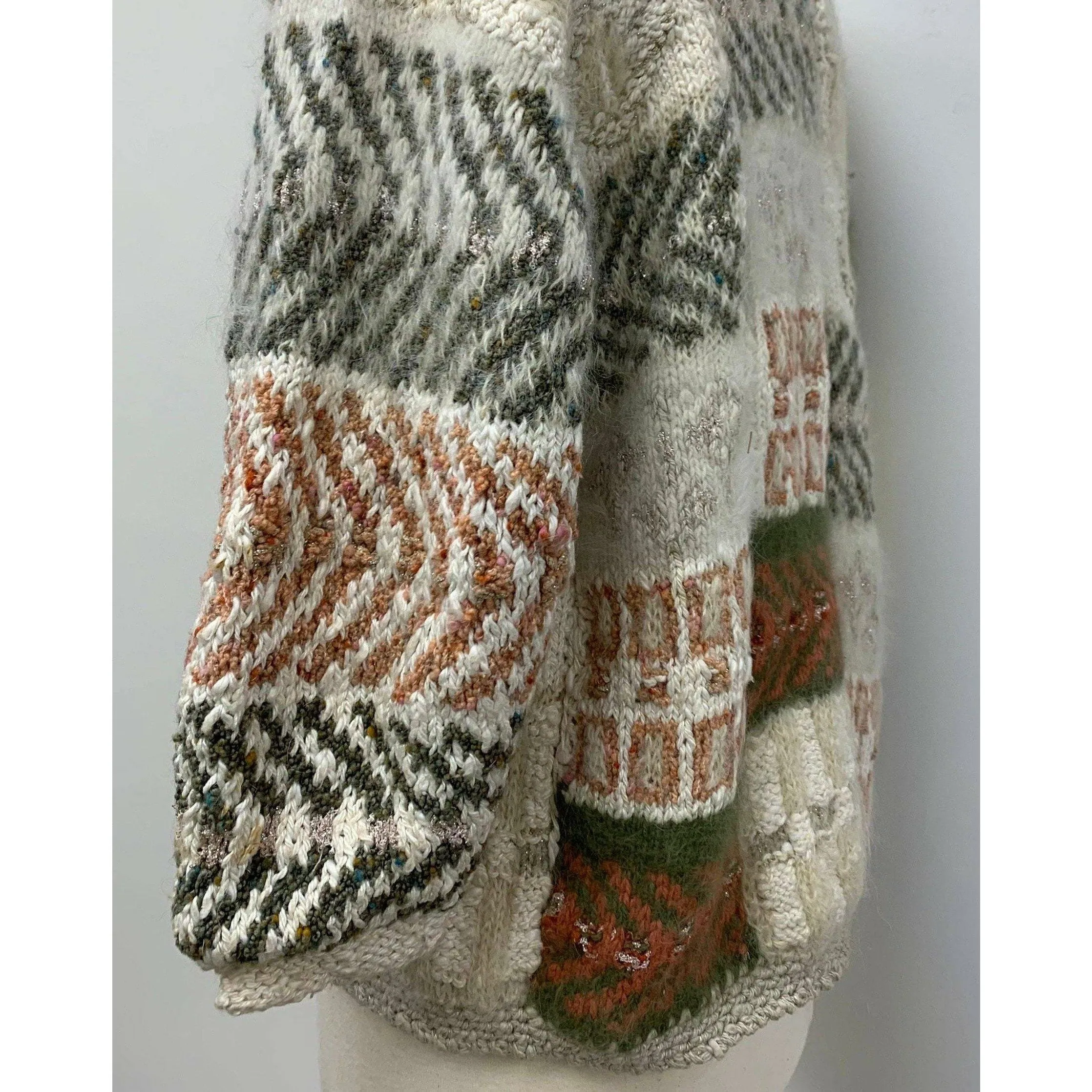 1980 Anny Blatt designed hand knit. The yarns are all French and Italian. Wool, Angora, Cotton, Linen and Mohair. Size M