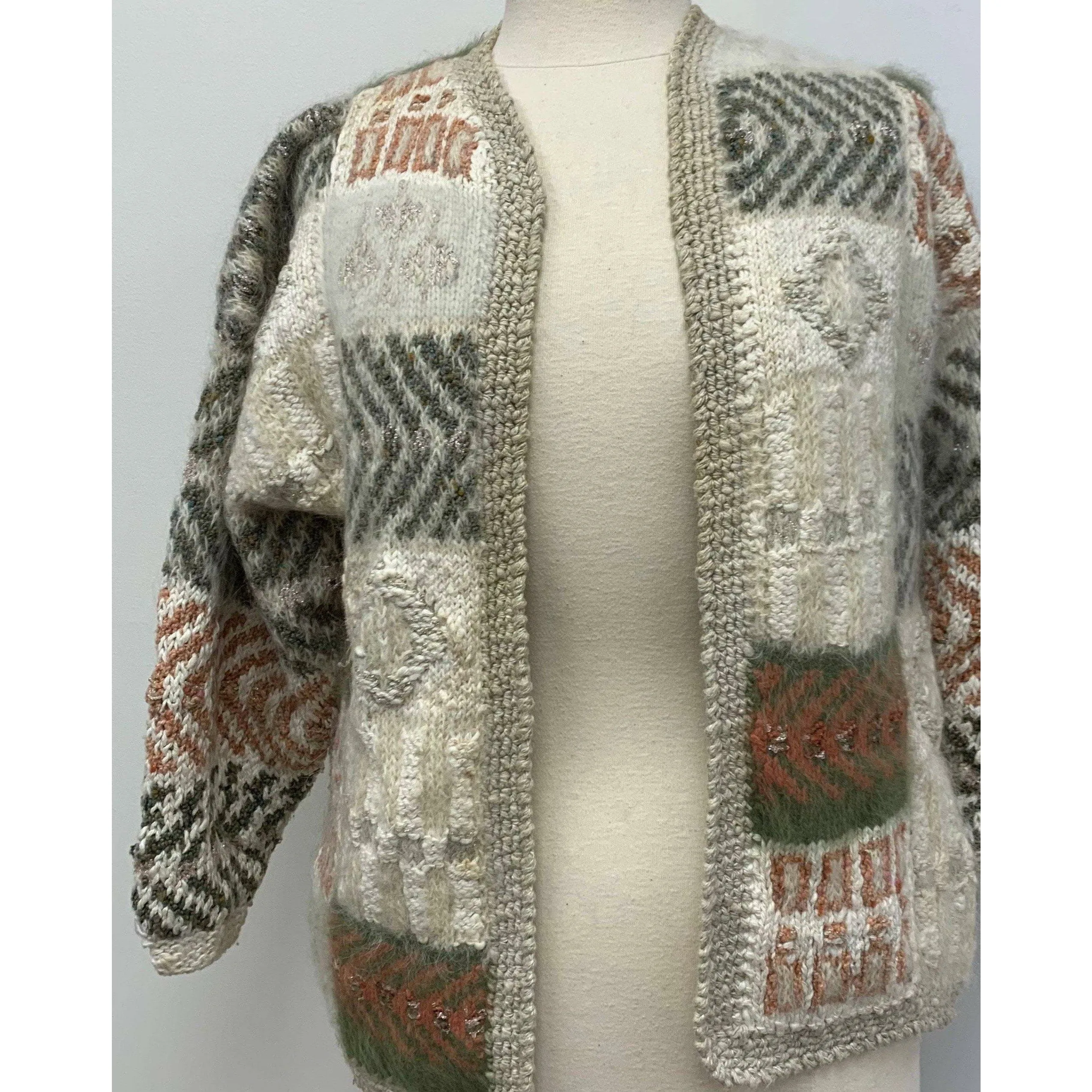 1980 Anny Blatt designed hand knit. The yarns are all French and Italian. Wool, Angora, Cotton, Linen and Mohair. Size M