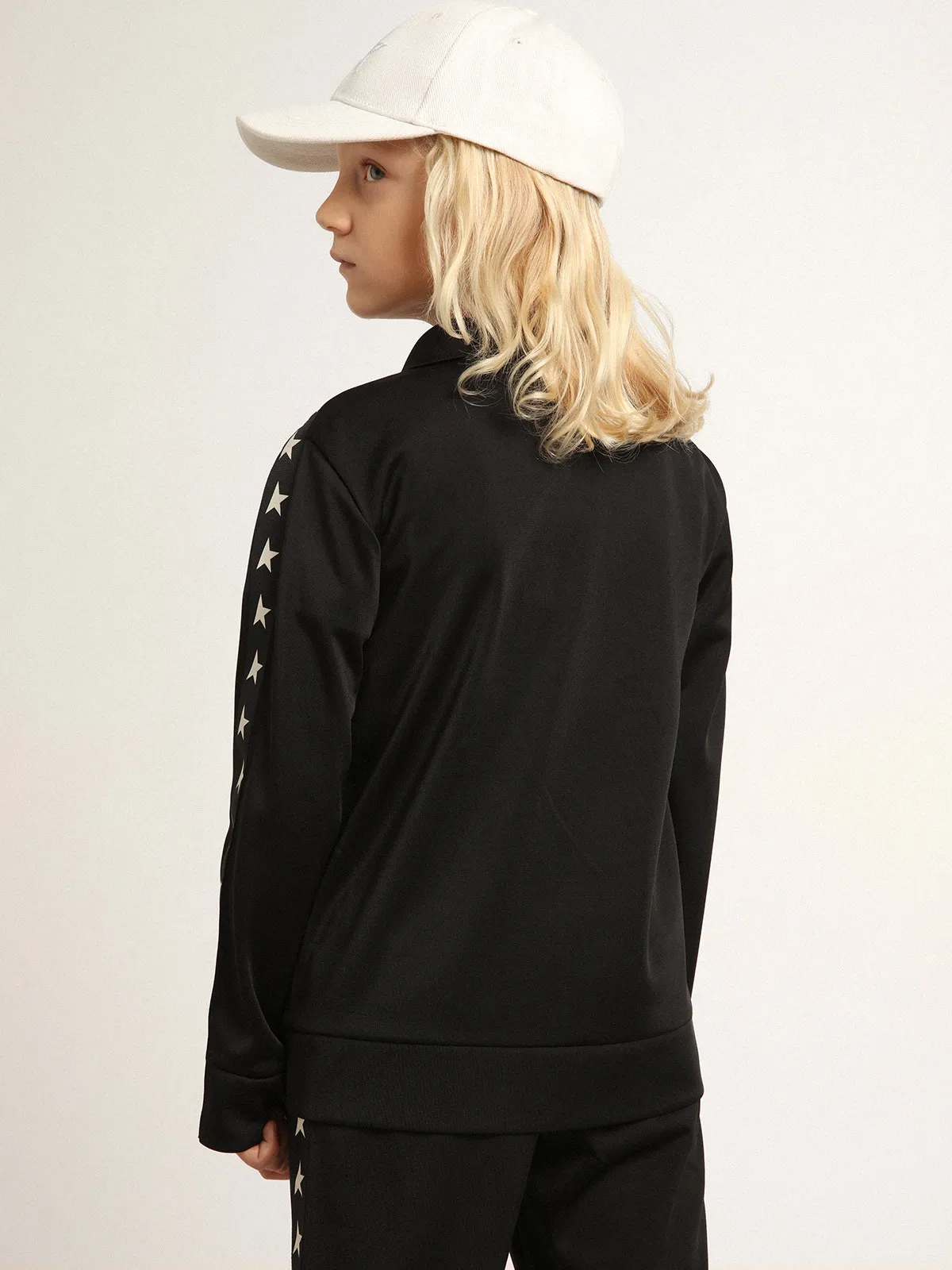 Black zipped sweatshirt with contrasting white stars