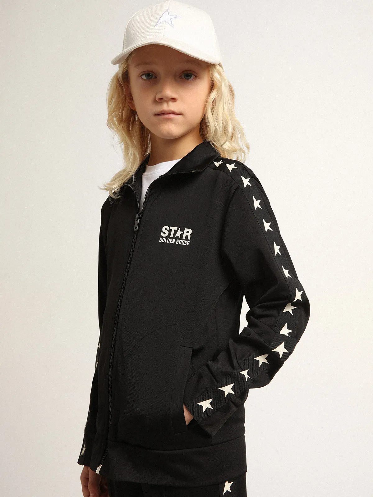 Black zipped sweatshirt with contrasting white stars