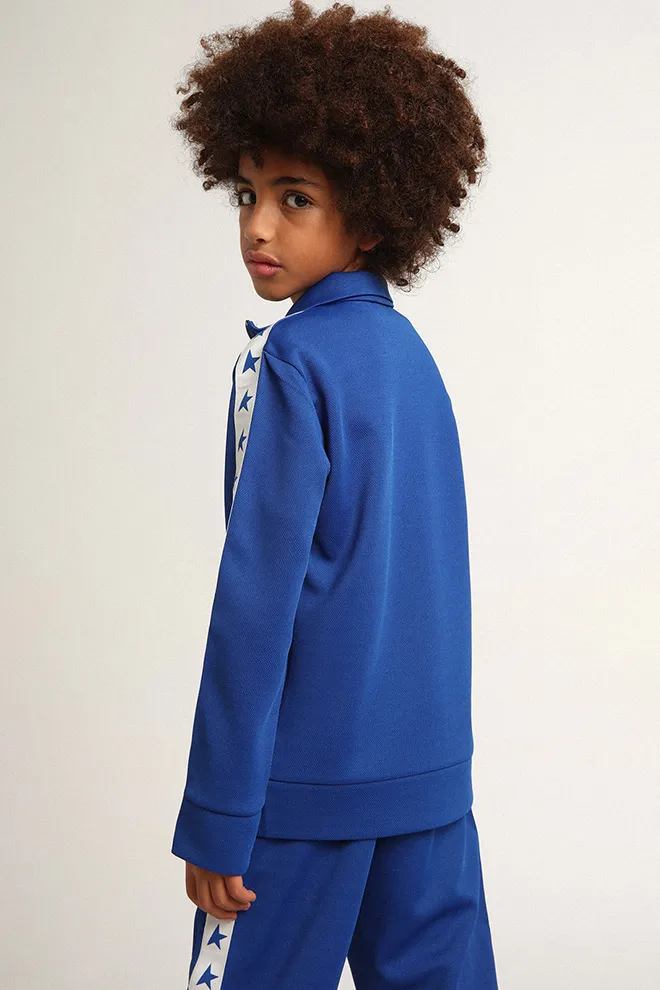 Bright blue zipped sweatshirt with white strip and bright blue stars