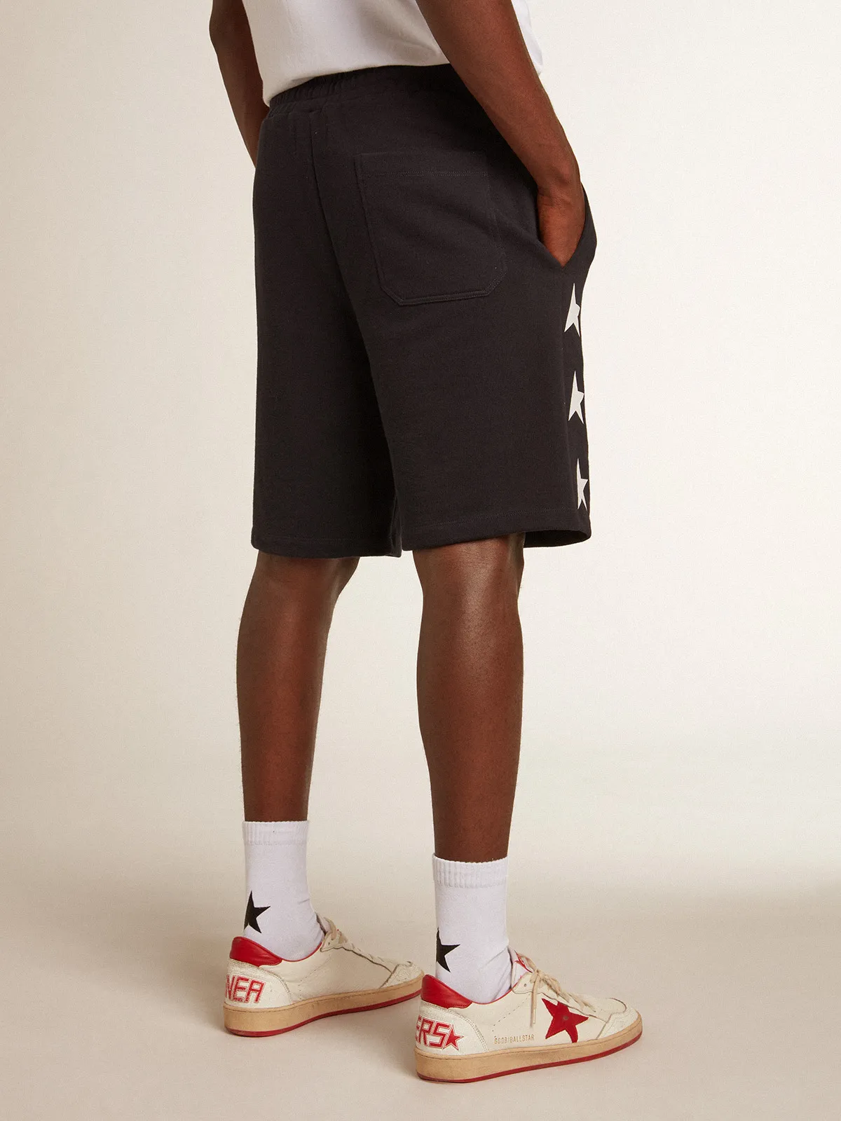 Men's black bermuda shorts with white stars