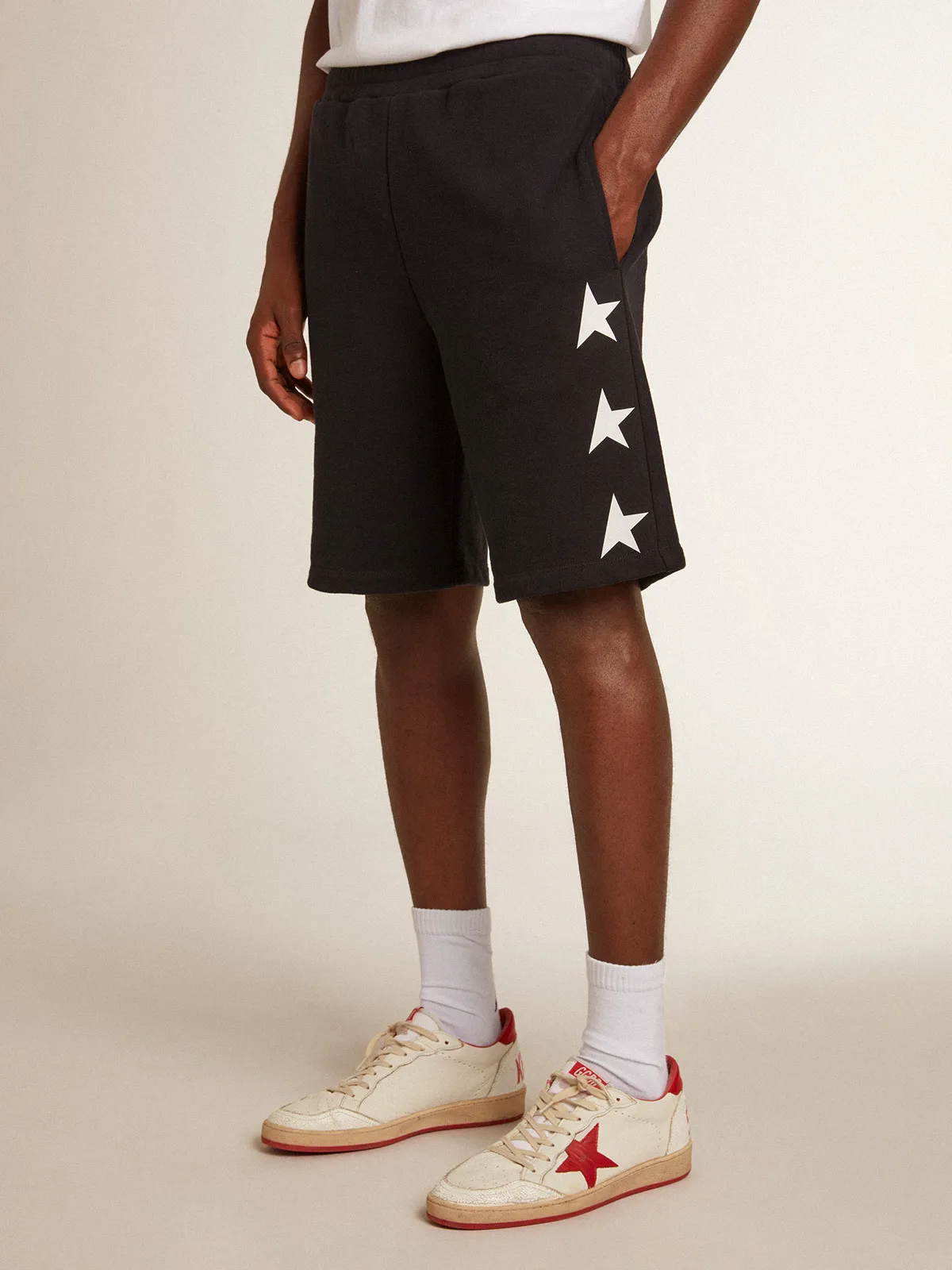 Men's black bermuda shorts with white stars