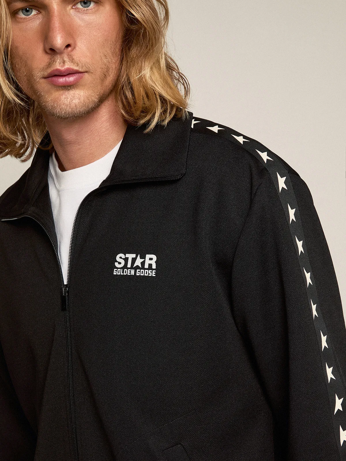 Men's black zipped sweatshirt with white stars