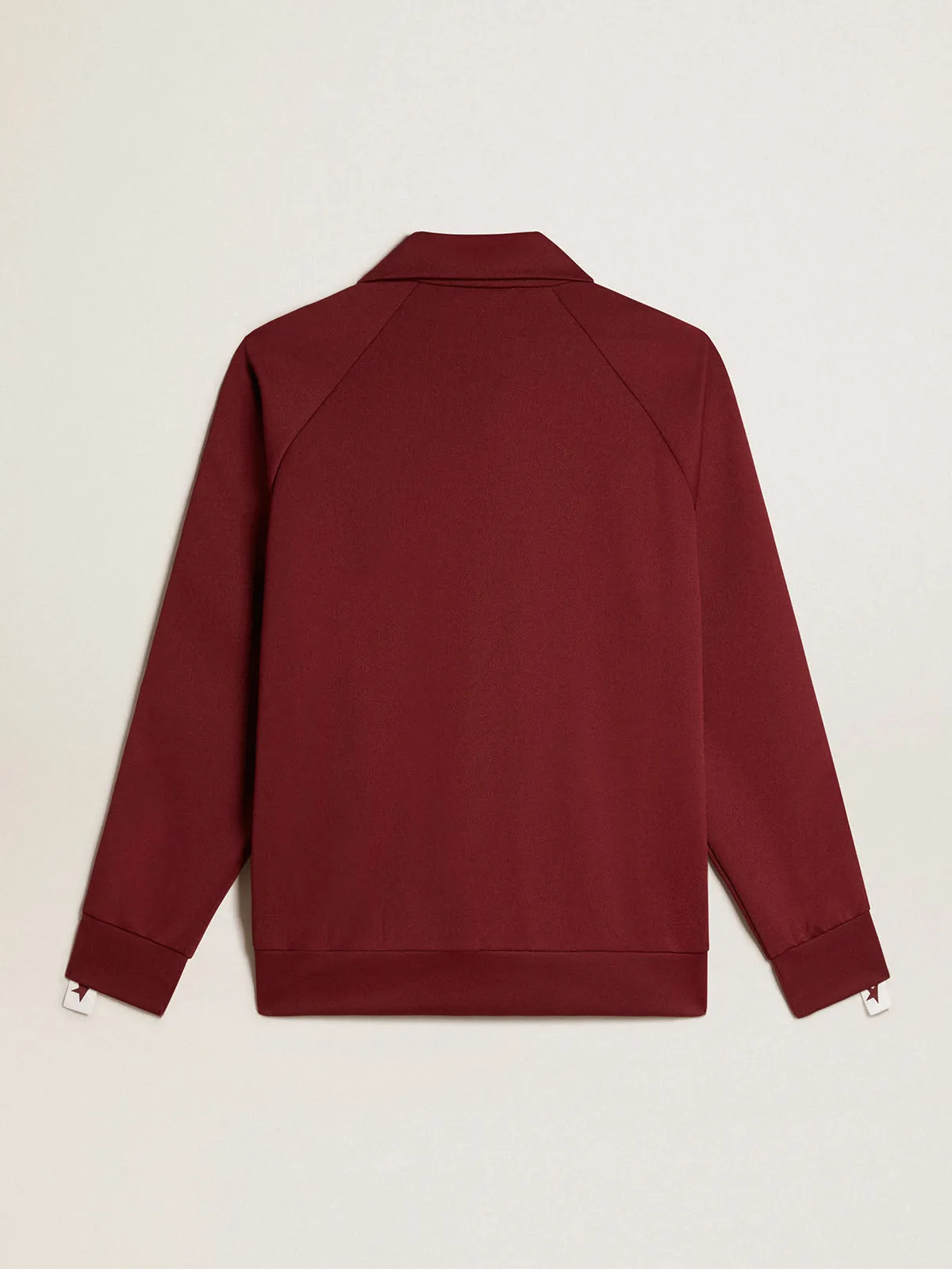 Men’s burgundy zipped sweatshirt with white strip and contrasting stars